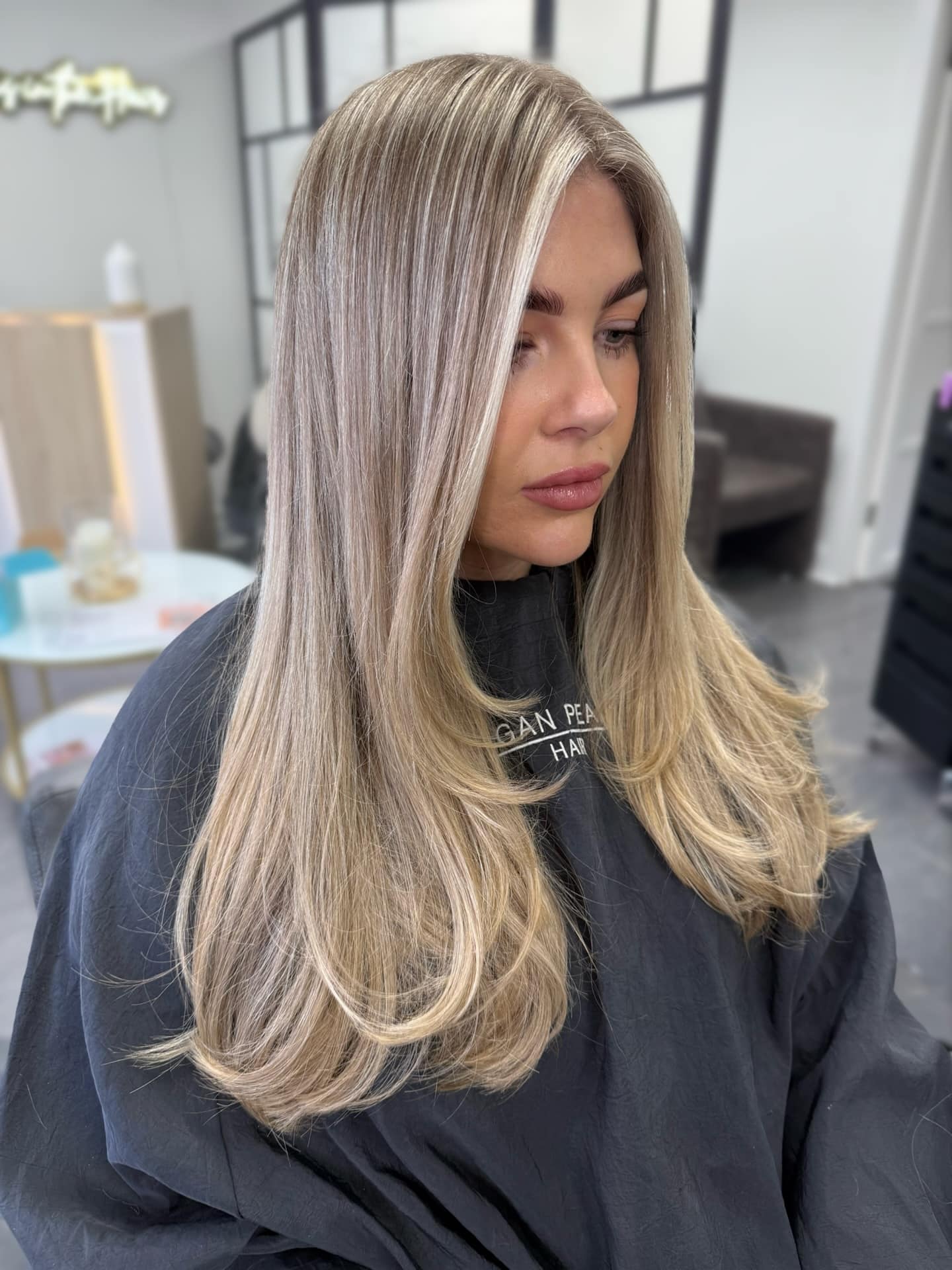 33. Icy Platinum Foil Highlights with Soft Face Framing Layers