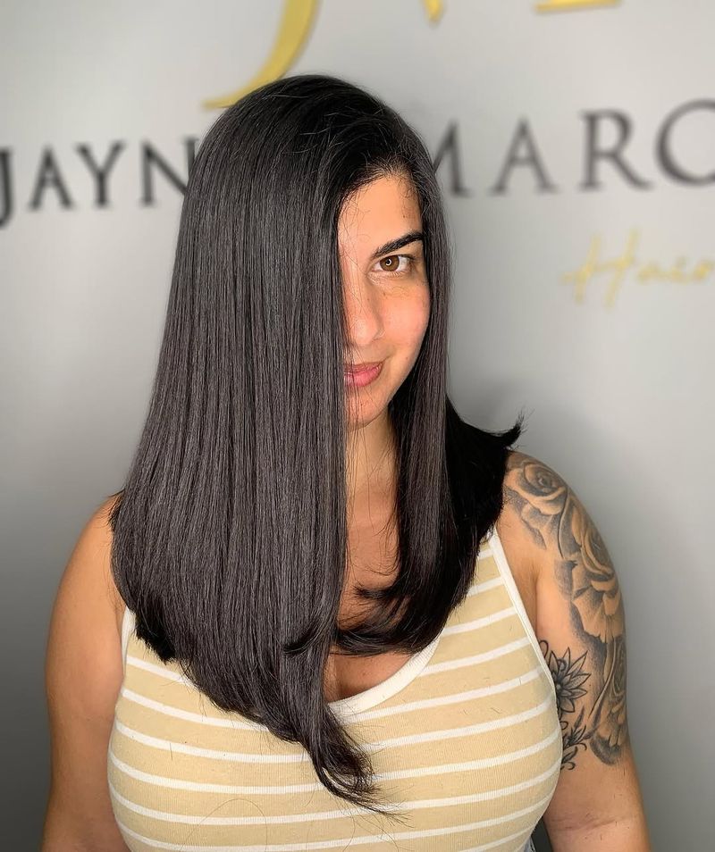 73. Jet Black Asymmetrical Lob
