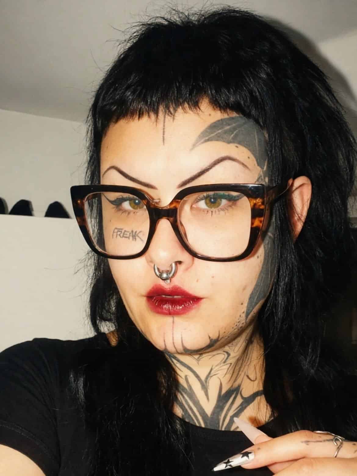 43. Jet Black Mullet with Jagged Micro Bangs
