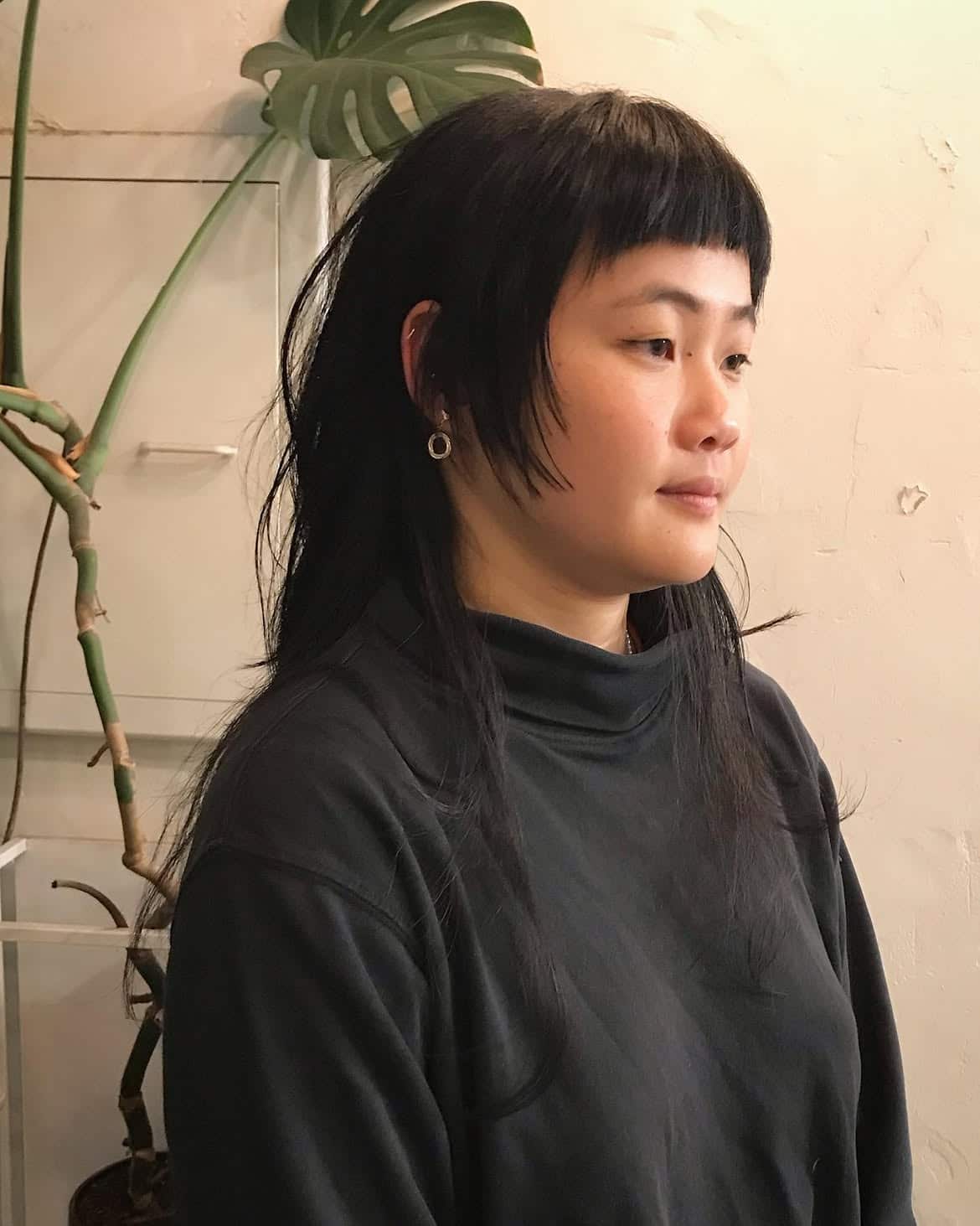 16. Jet Black Shag with Baby Bangs