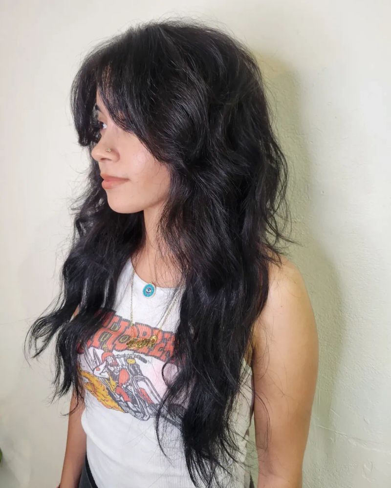 47. Jet Black Waves with Curtain Bangs