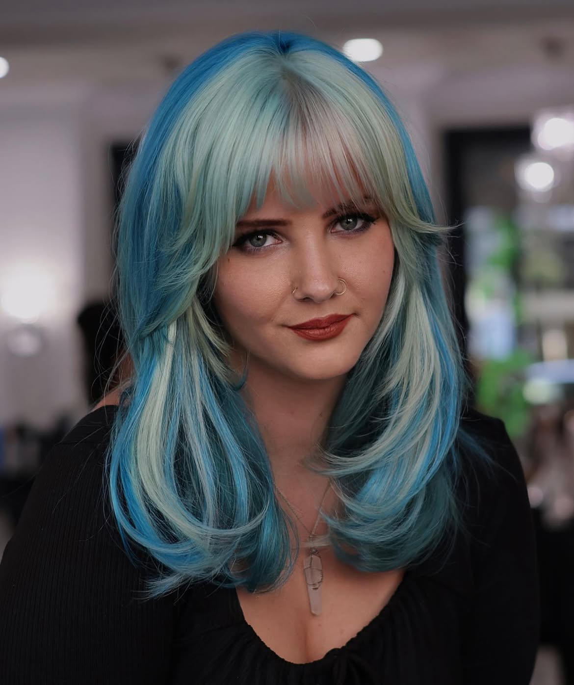 3. Layered Pastel Blue with Frosted Curtain Bangs