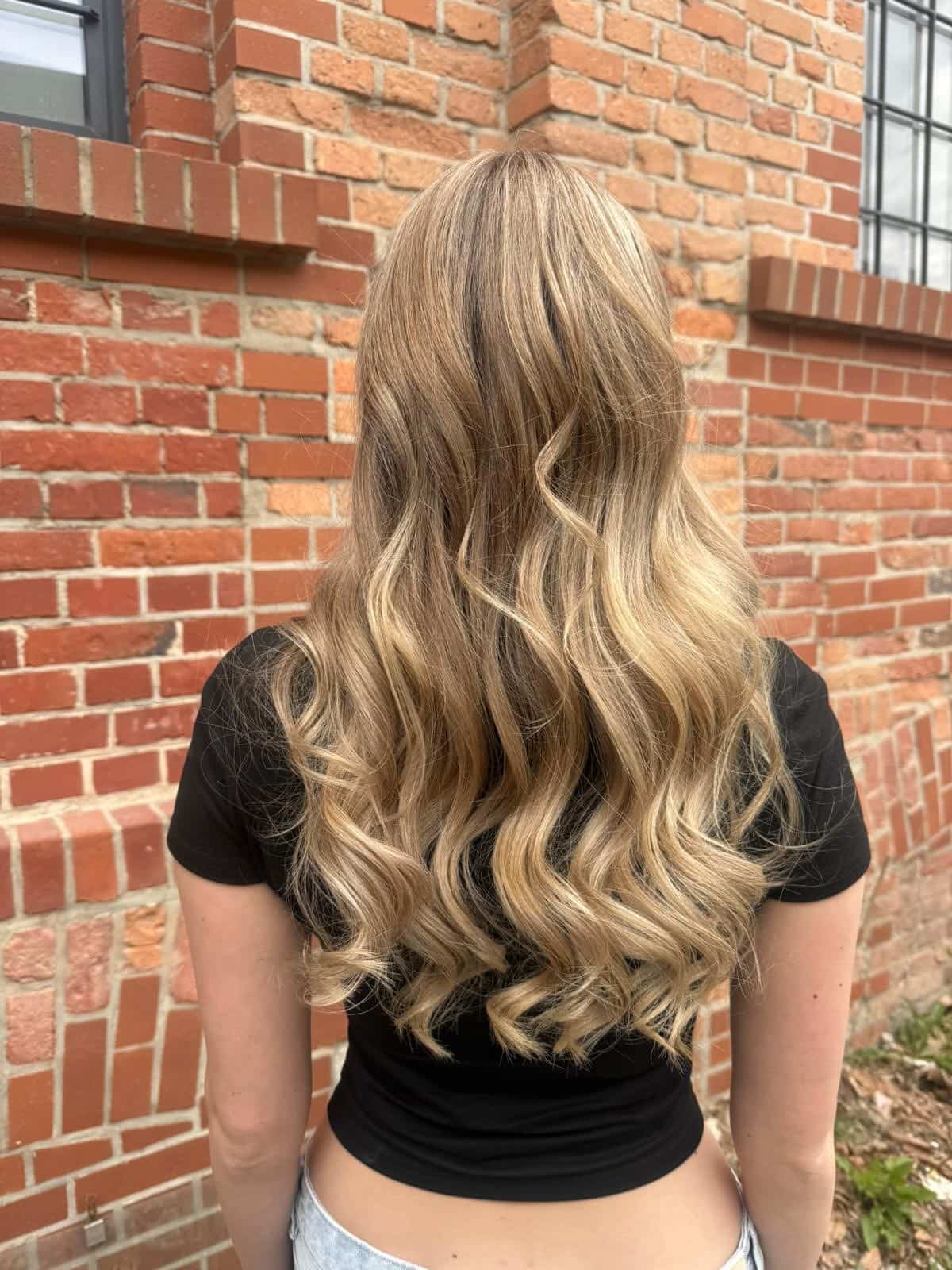 5. Long Champagne Blonde Waves with Soft Layers
