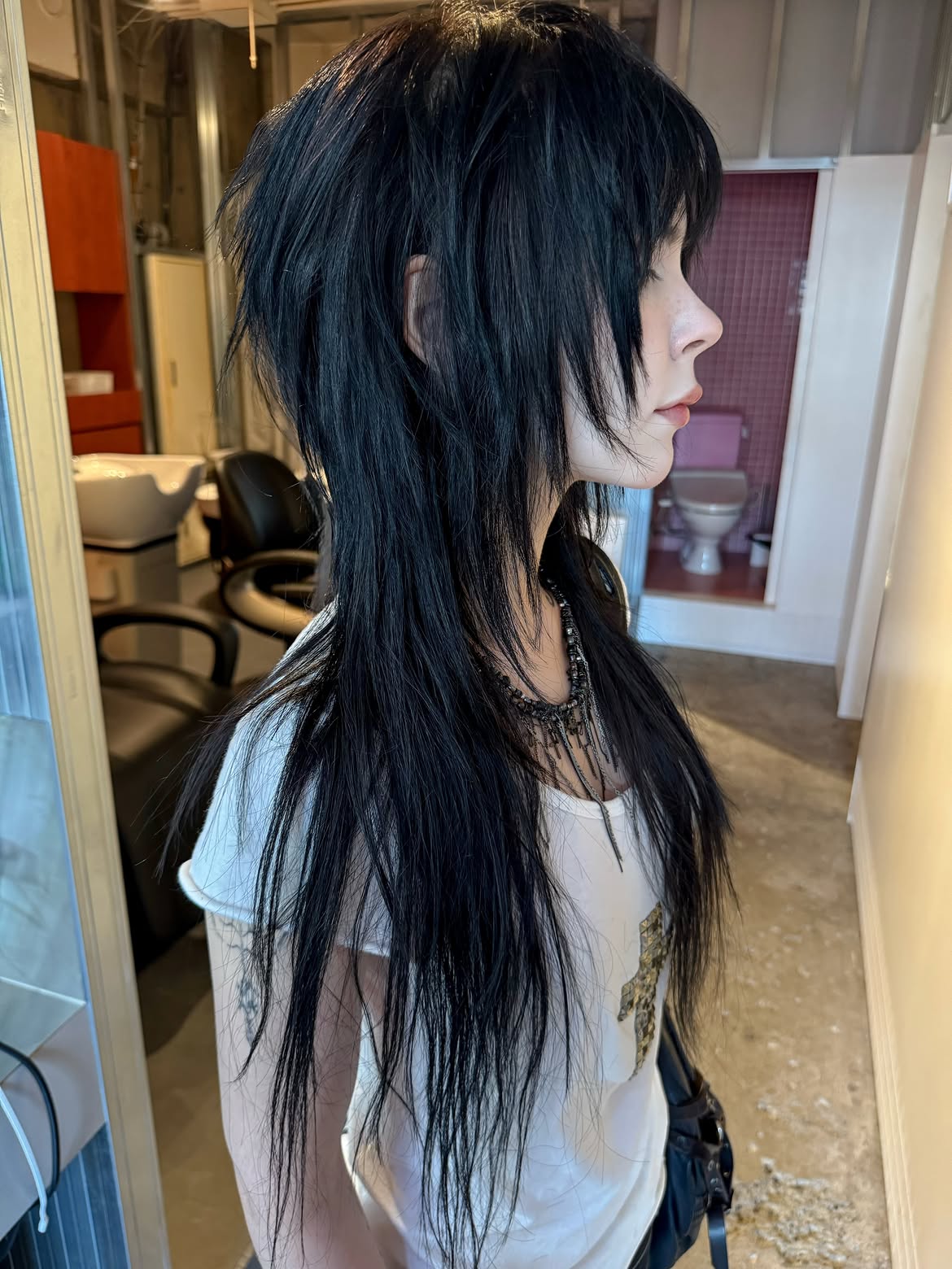 5. Long Jet-Black Wolf Mullet with Wispy Layers