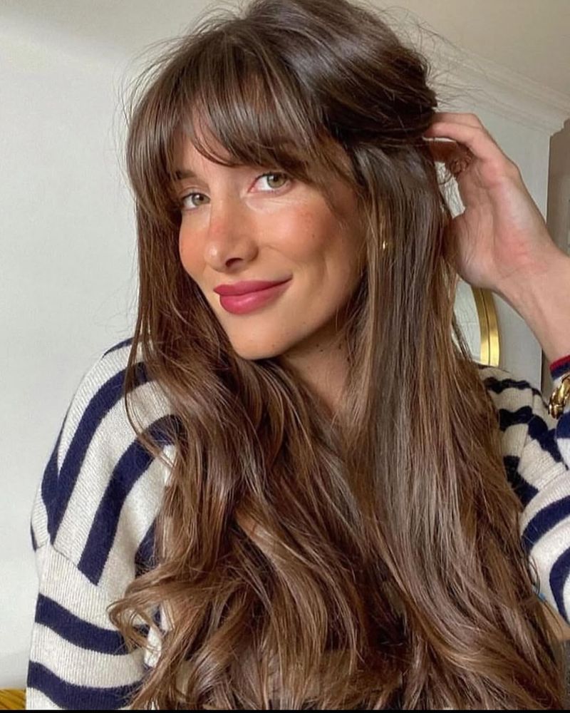 51. Long Layers with Blended Curtain Bangs