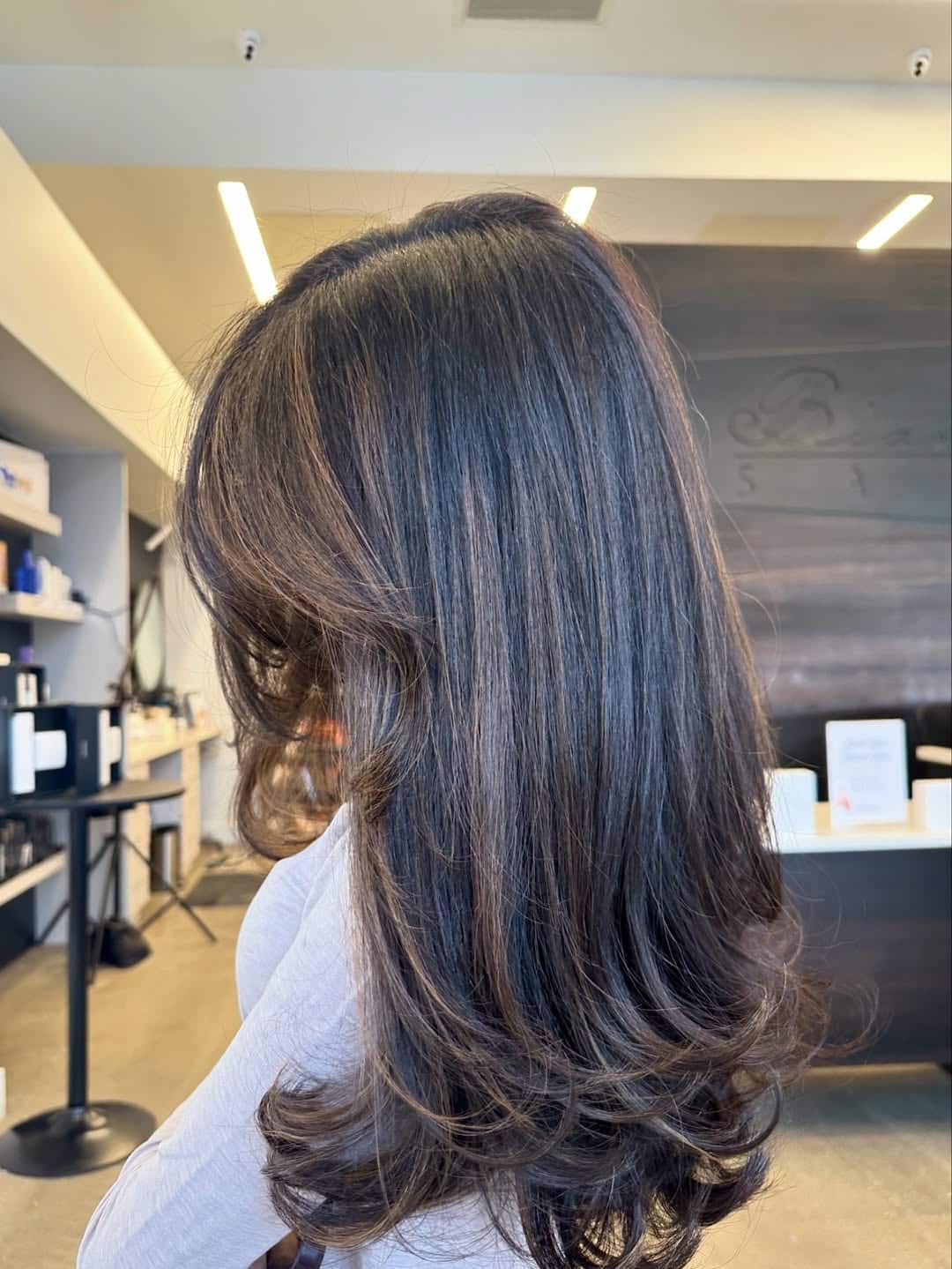 18. Long Layers with Subtle Caramel Highlights