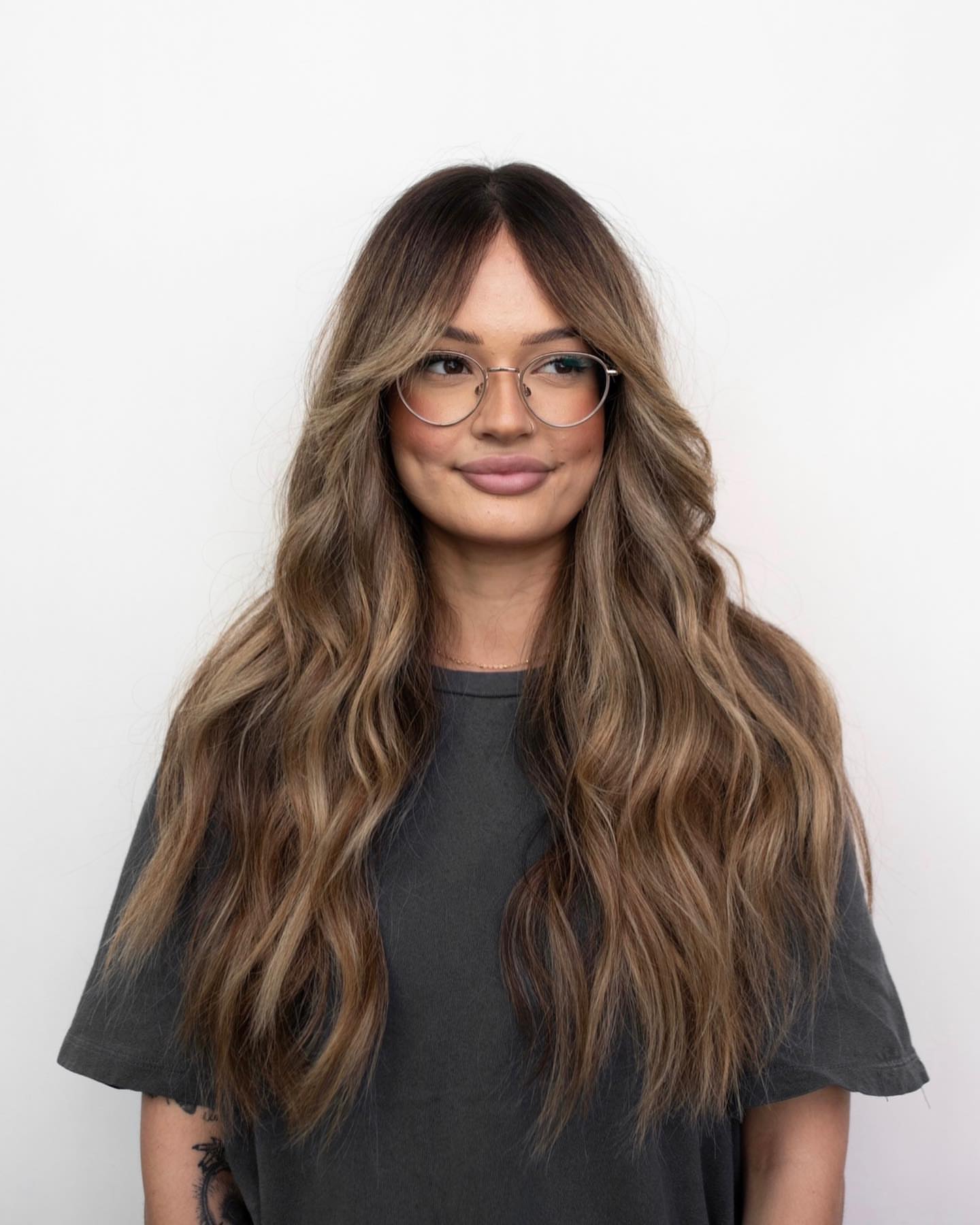 16. Long Smoky Waves with Curtain Bangs