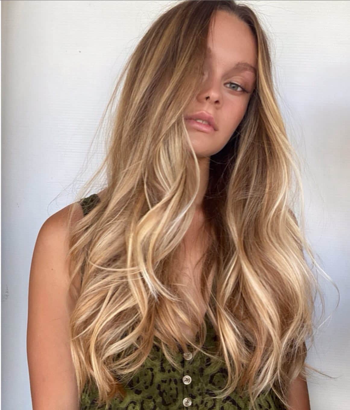 59. Long Tousled Blonde Balayage Waves
