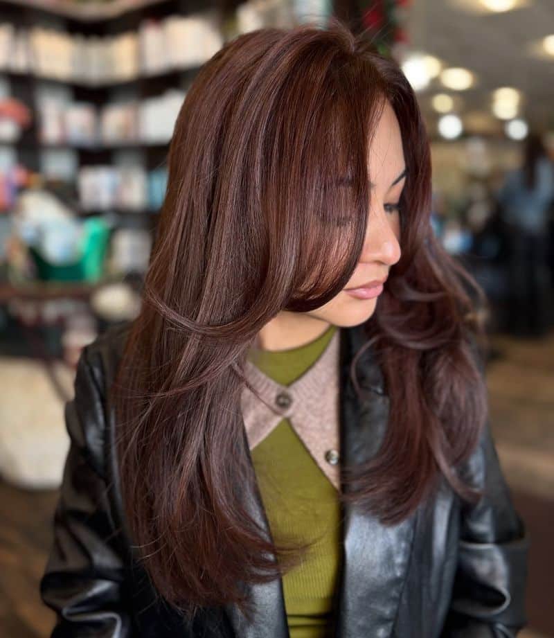 30. Mahogany Blowout with Soft Face-Framing Layers
