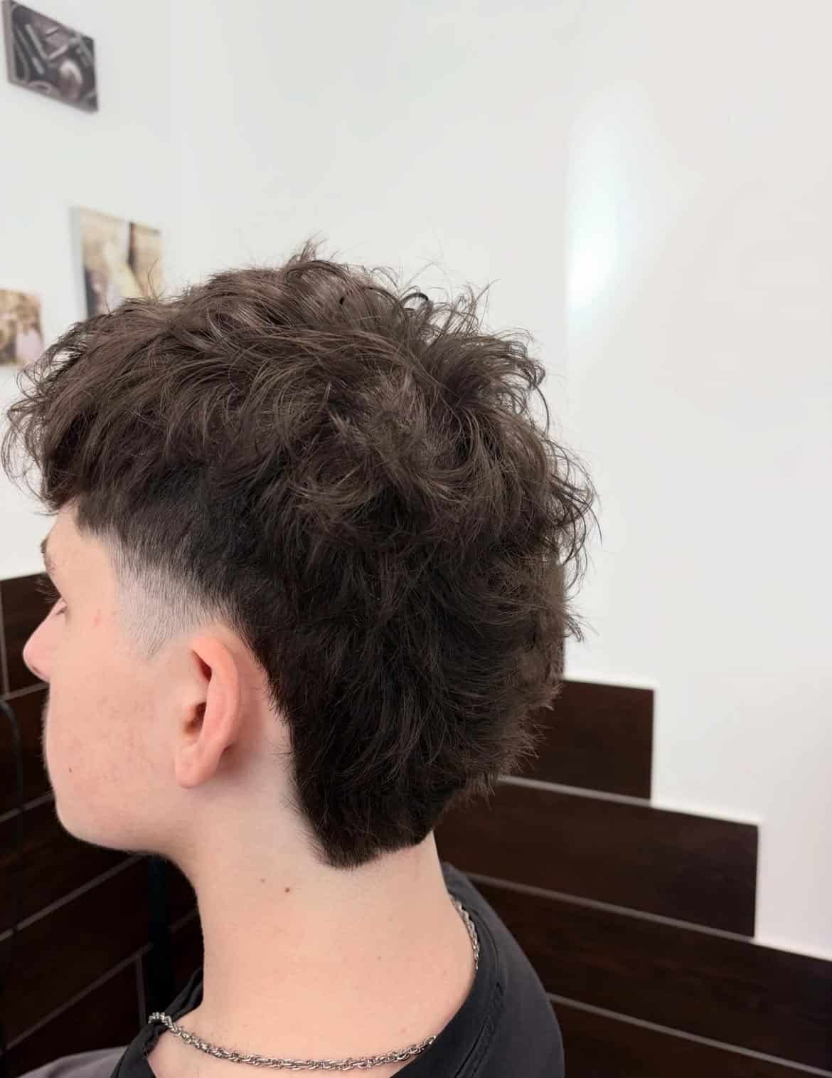 28. Messy Curly Taper Mullet