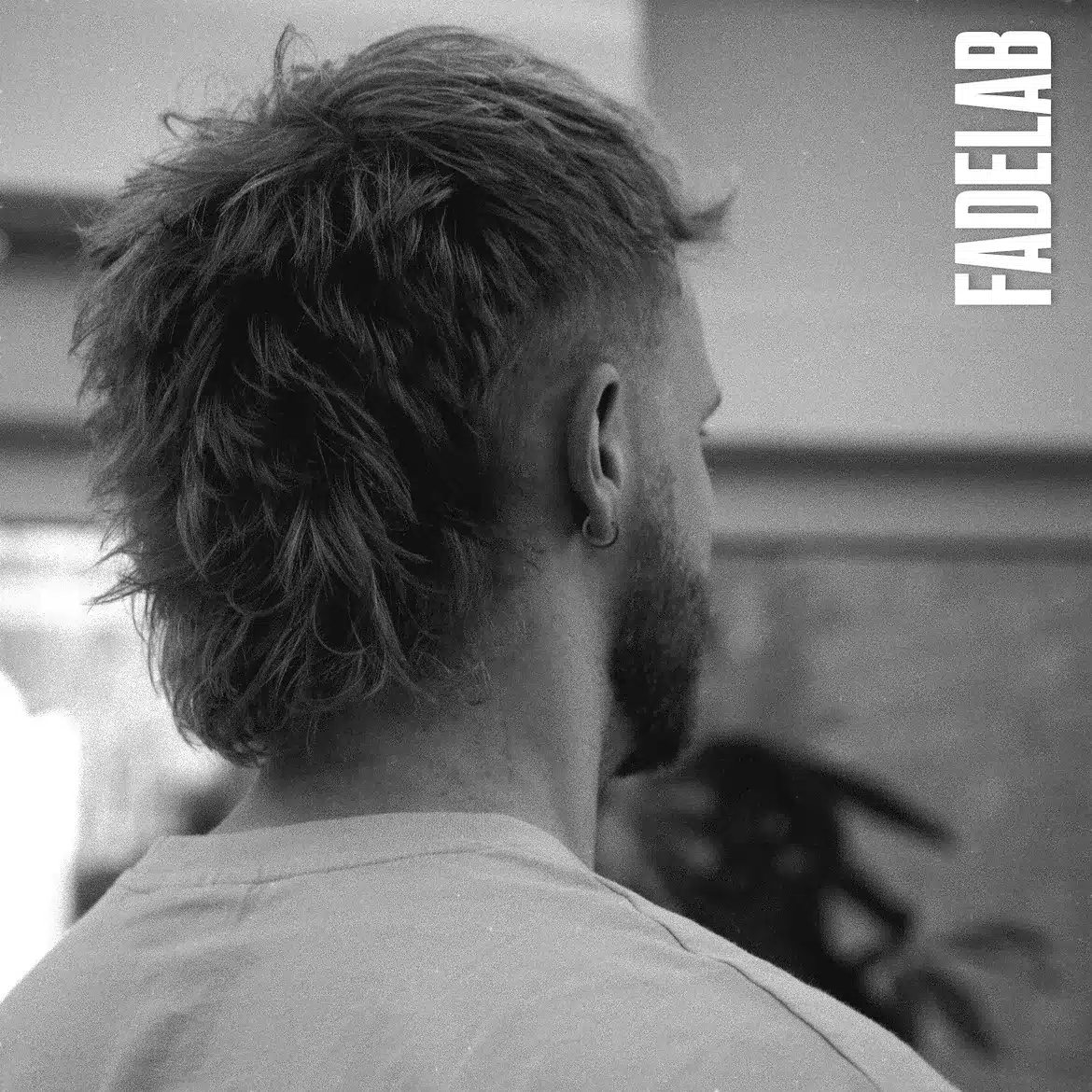 36. Messy Wavy Mullet Fade