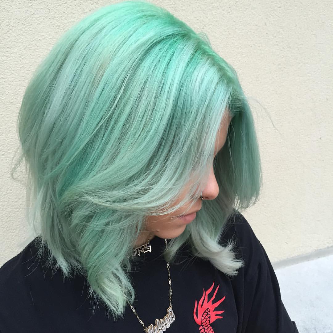 5. Mint Green Layered Lob with Side-Swept Bangs