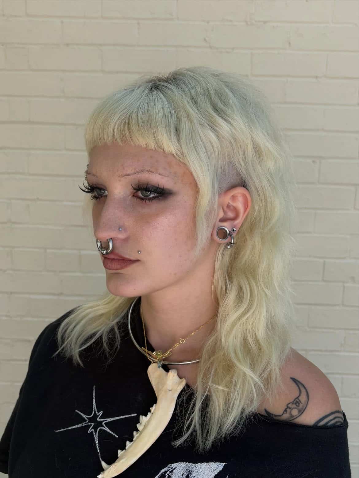27. Platinum Micro-Bang Undercut Mullet