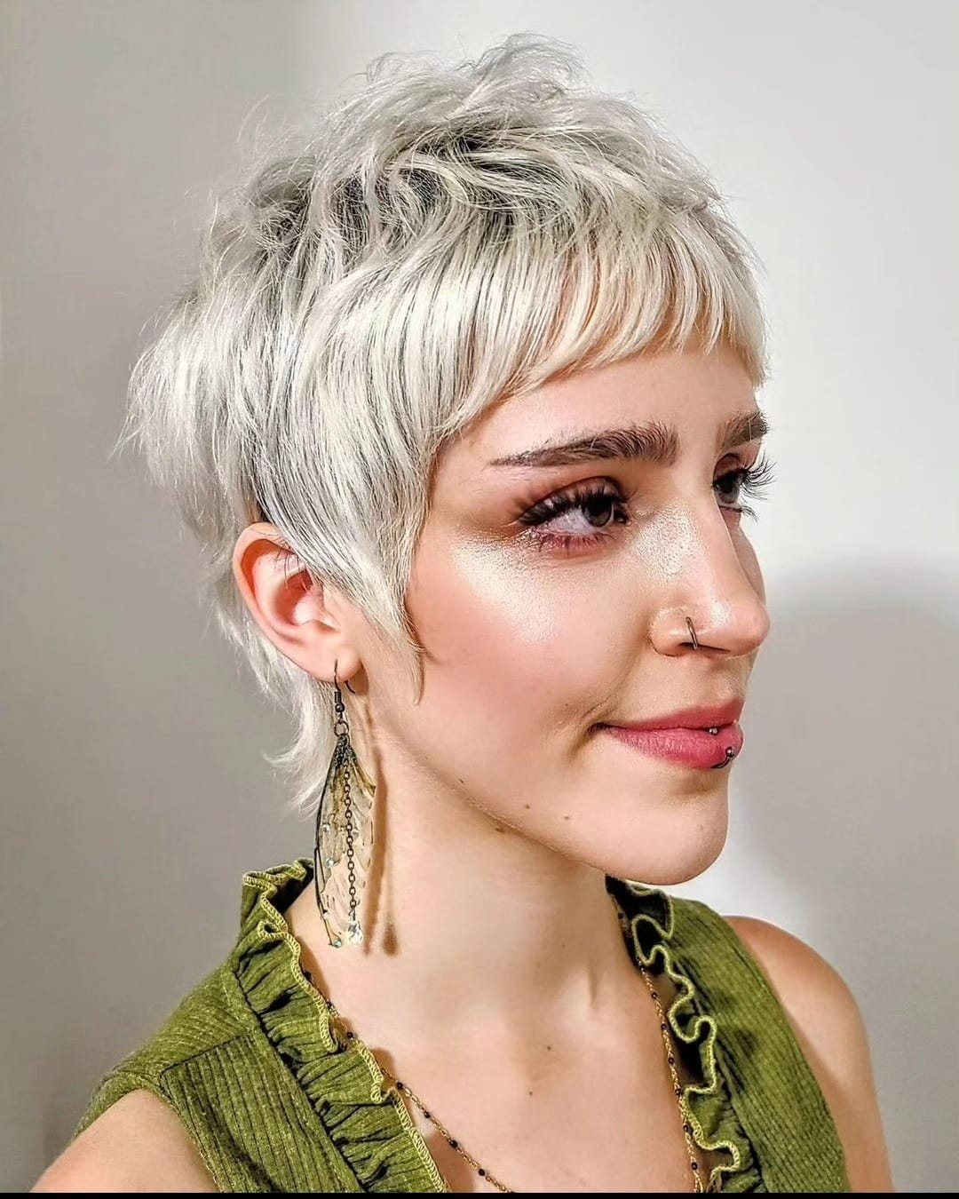 29. Platinum Pixie Mullet with Baby Bangs