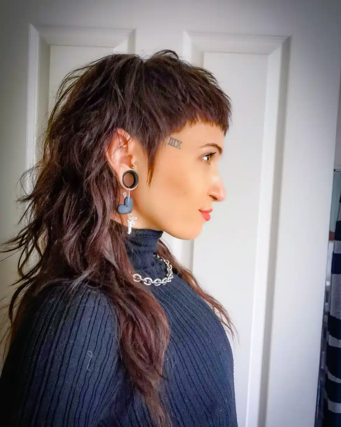 40. Punk Shag Mullet with Baby Bangs