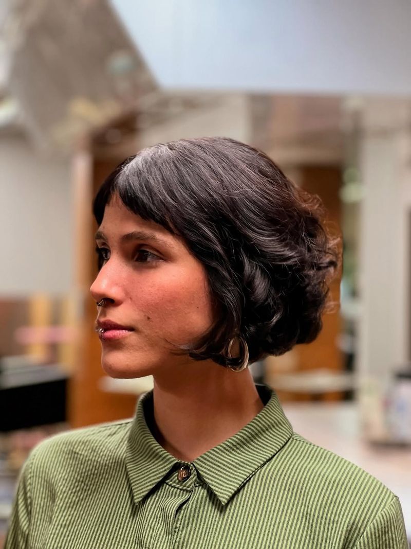 15. Retro Curly Bob with Baby Bangs