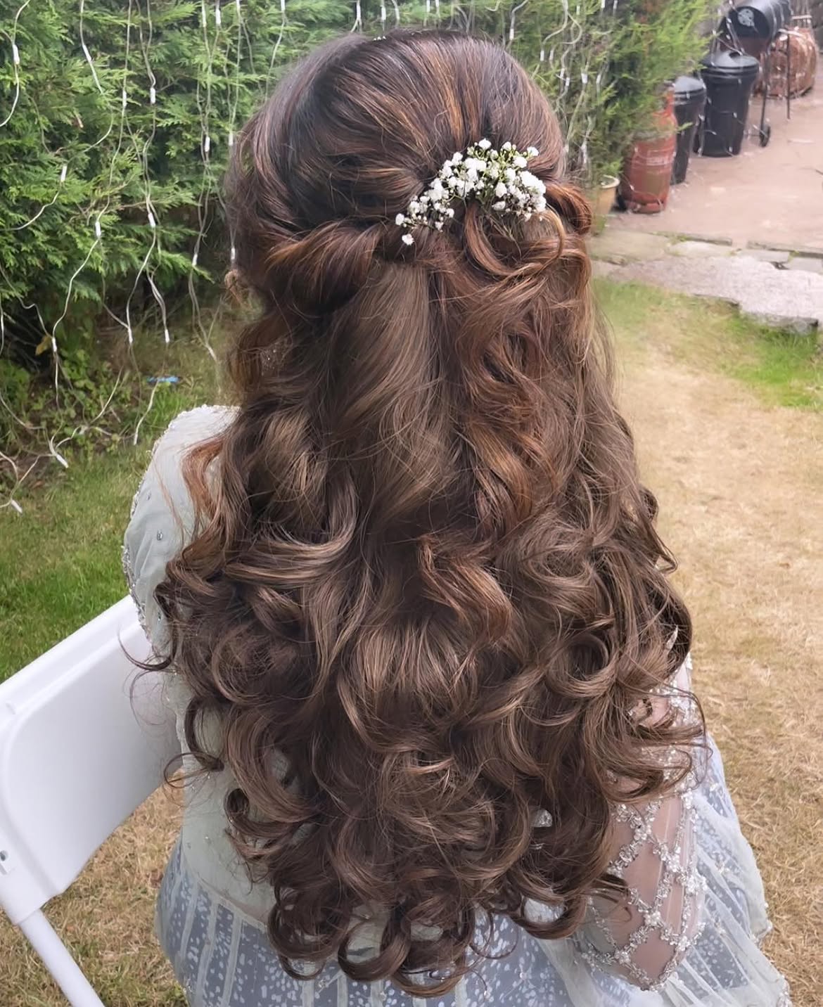 11. Romantic Half-Up Curls with Baby's Breath