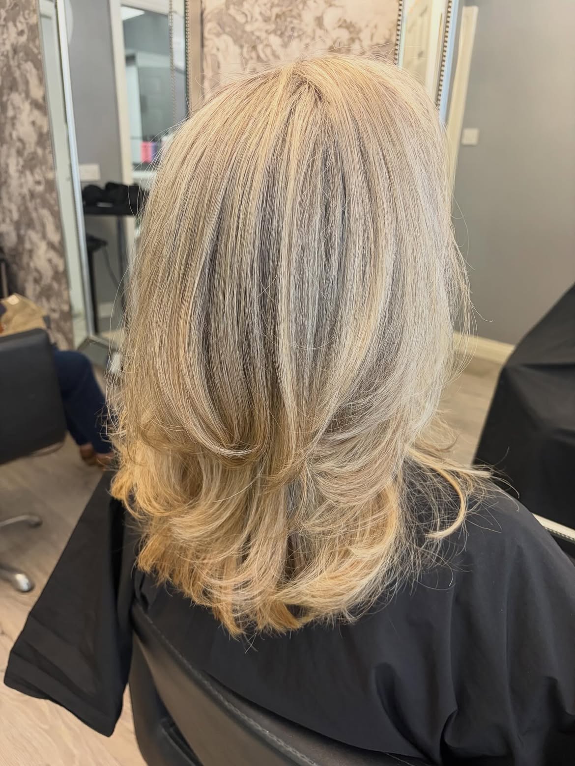 41. Root-Smudged Ash Blonde Layers