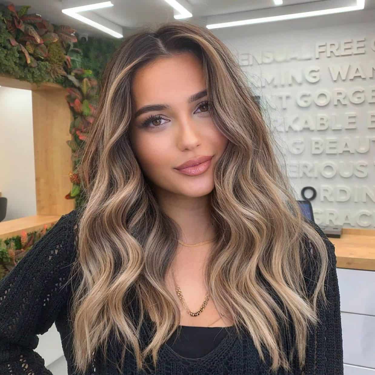 47. Rooted Beige Balayage with Soft Waves