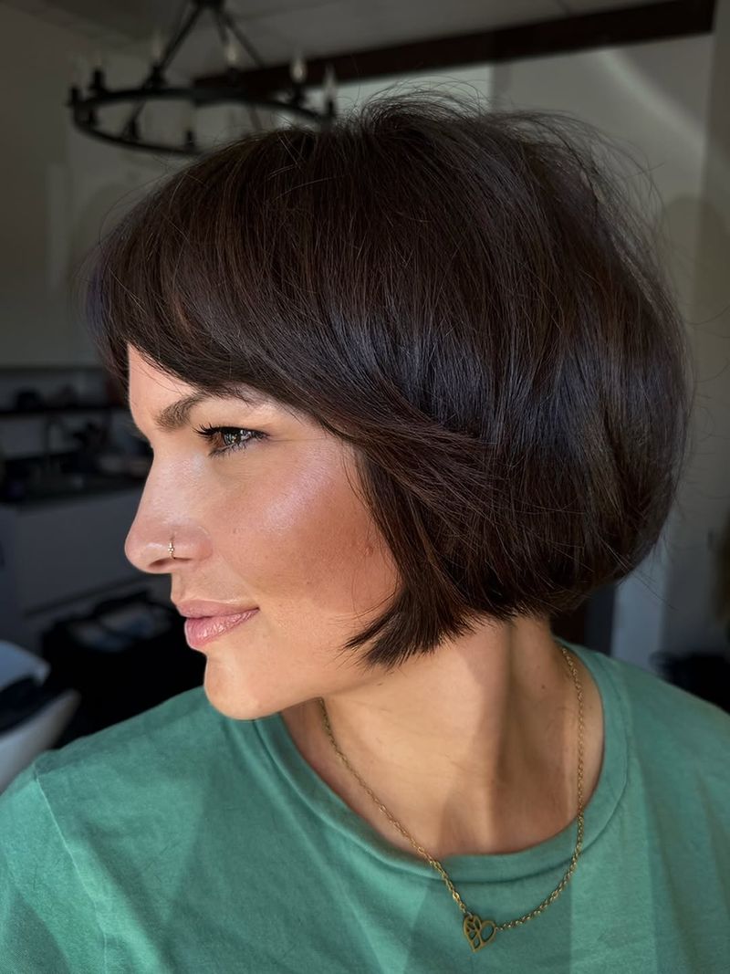 5. Rounded Brunette Bob with Soft Bangs