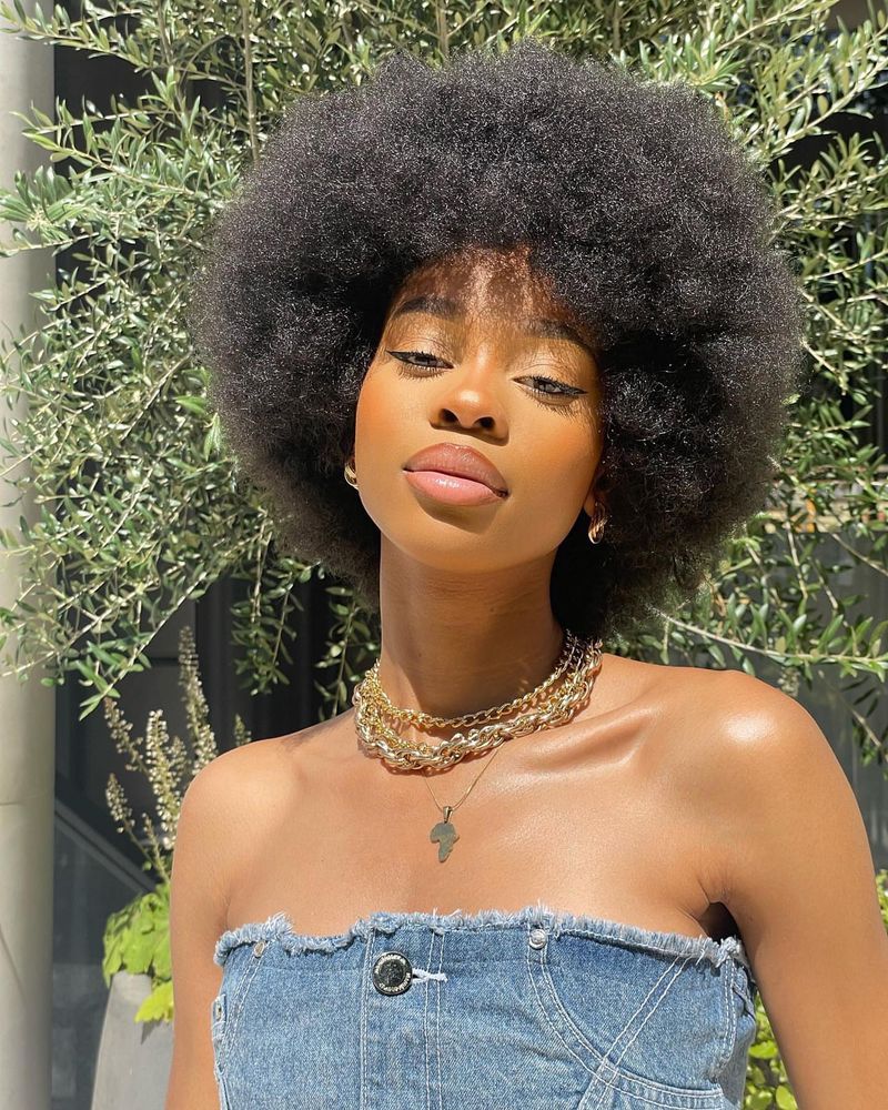 48. Rounded Out Afro with Full Volume