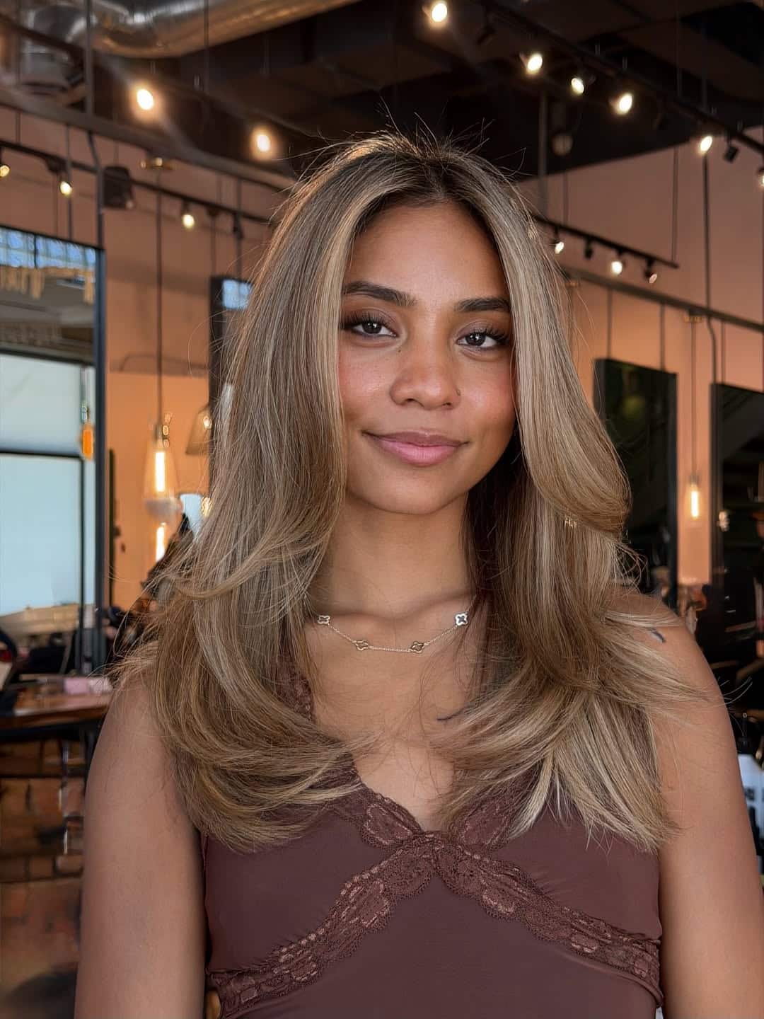 15. Sandy Ash Bronde with Curtain Layers