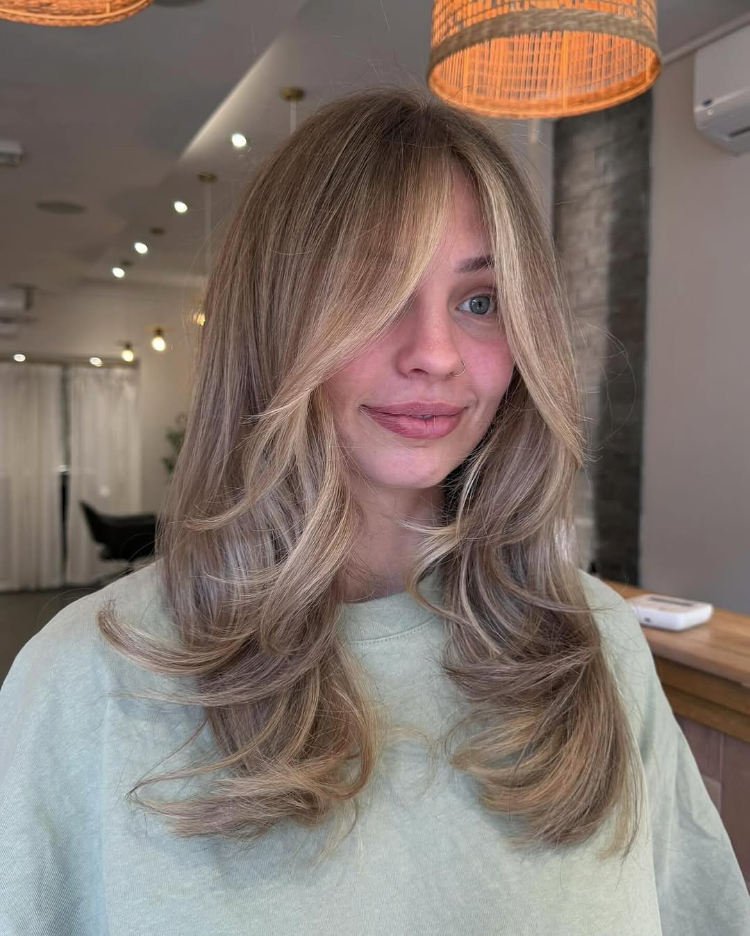 6. Sandy Blonde Curtain Layers
