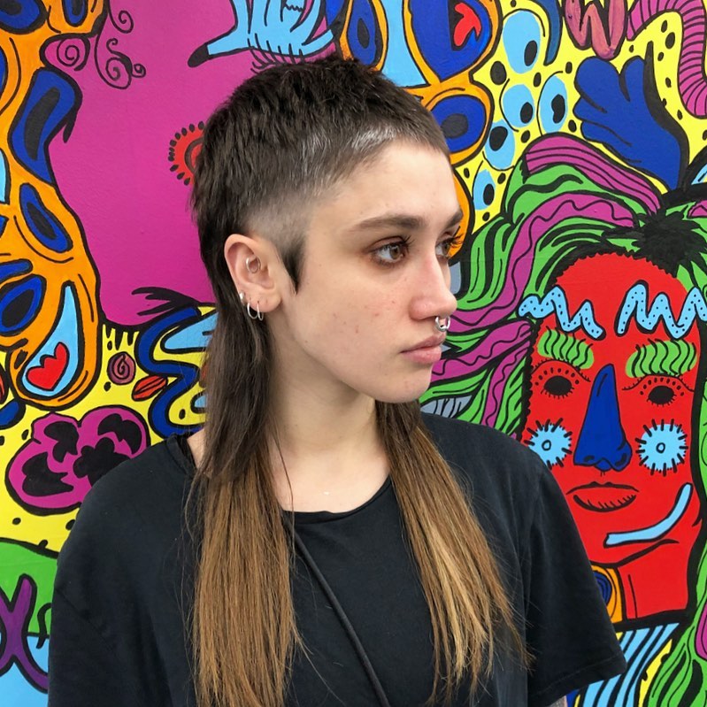 41. Shaved-Side Punk Mullet with Long Back Length