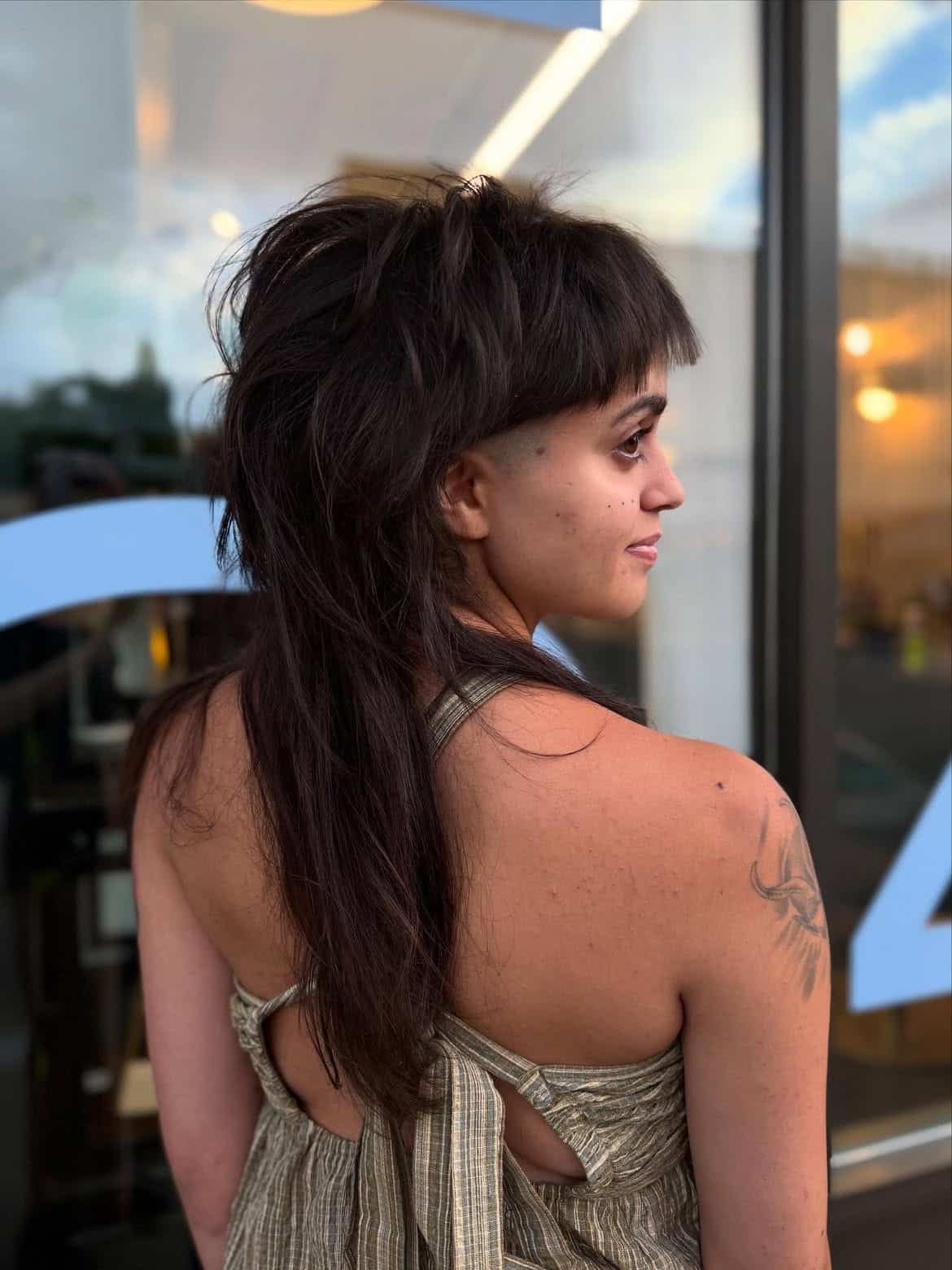 11. Shaved Temple Long Mullet with Micro Bangs