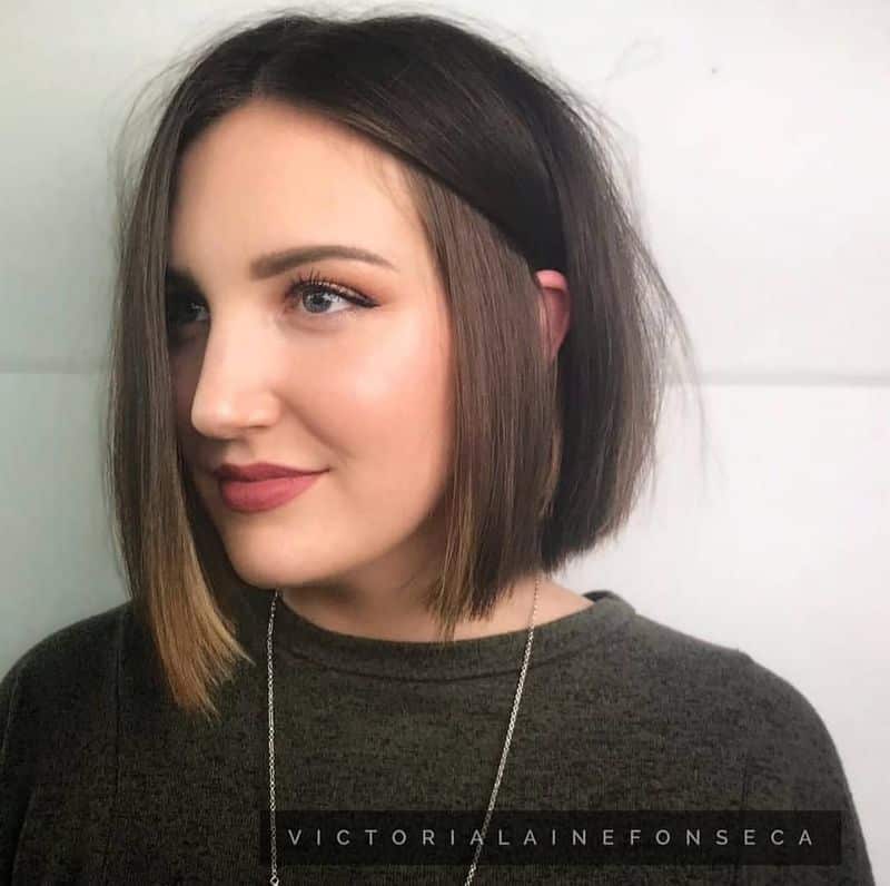 59. Side-Swept Angled Brunette Bob