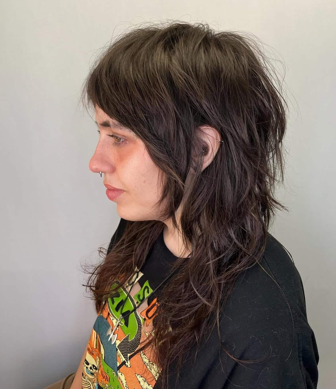 23. Side-Swept Brunette Wolfy Shag Mullet