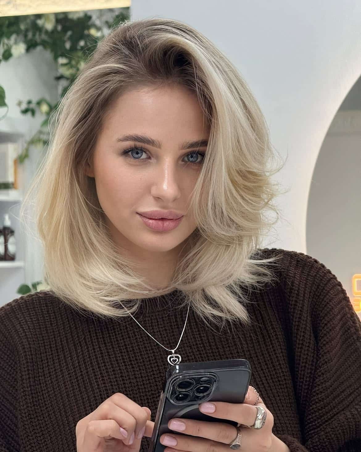 20. Side-Swept Butter Blonde Blowout