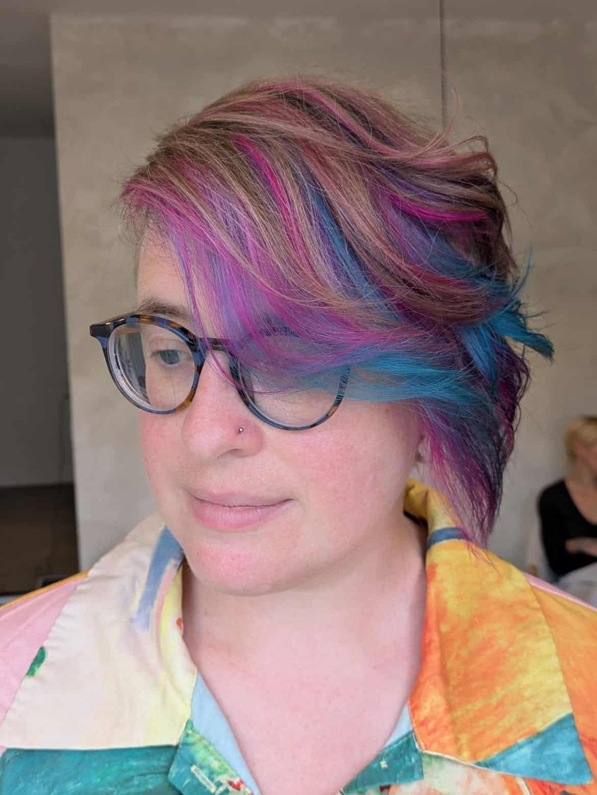 9. Side-Swept Pixie with Pink and Ocean Blue Streaks