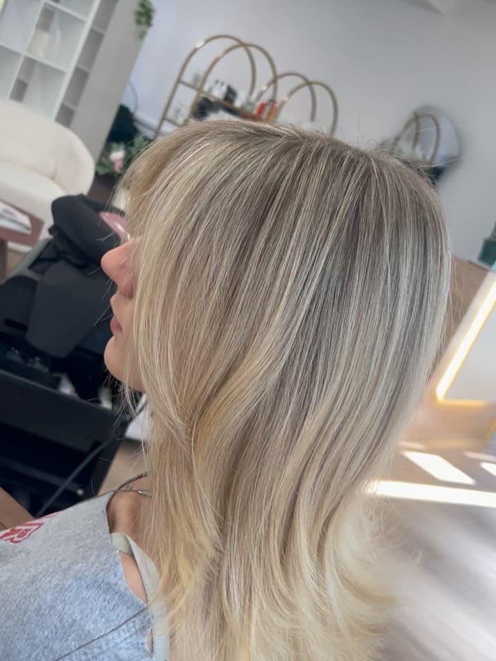 18. Silky Layers with Soft Bangs