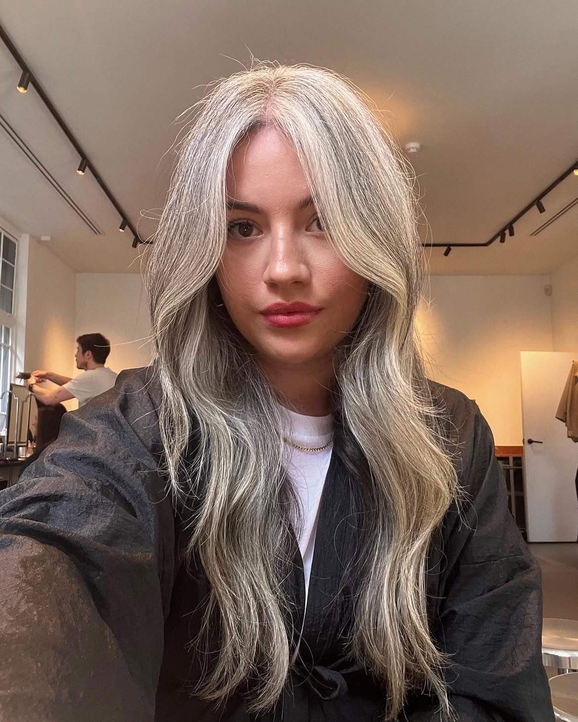 31. Silver Curtain Bangs with Long Waves