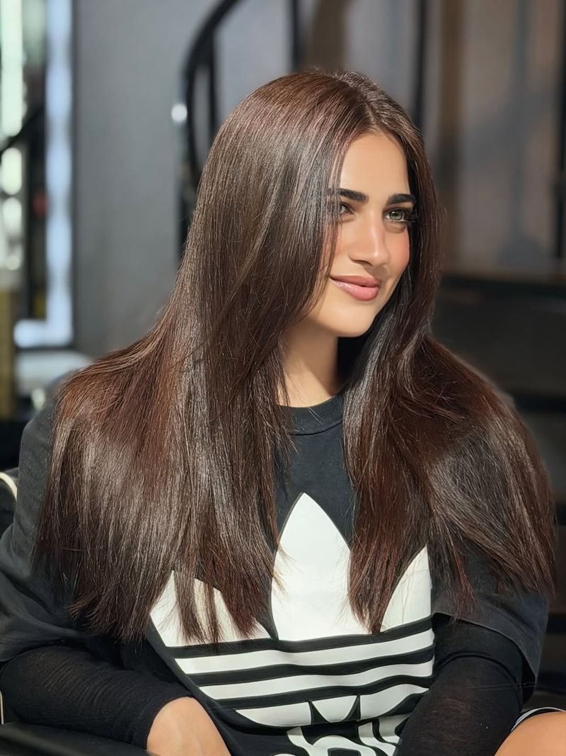 55. Sleek Chestnut Layers