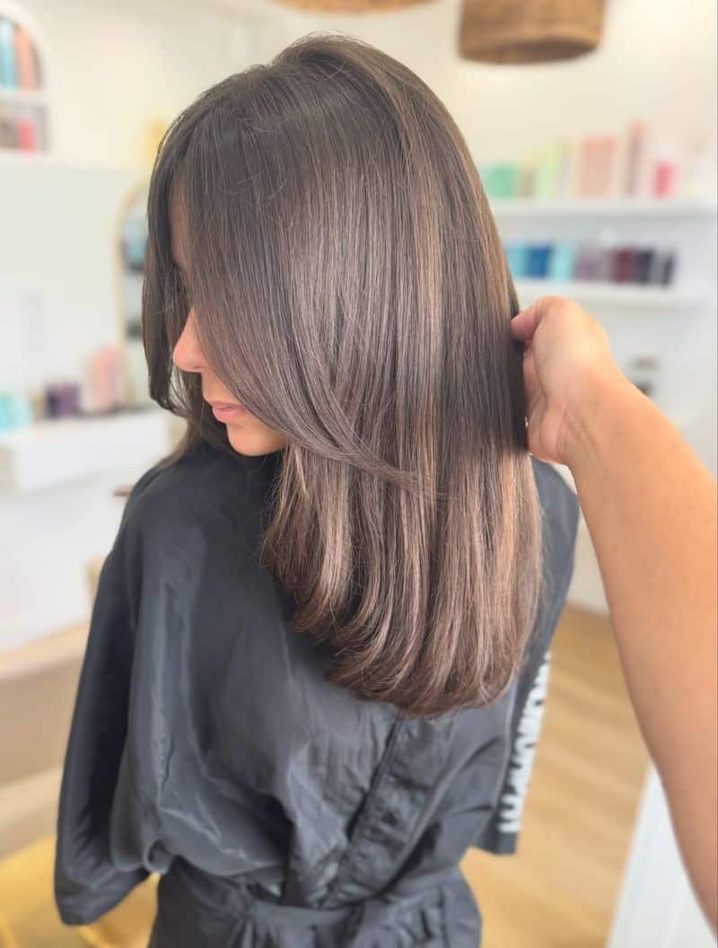 66. Sleek Chestnut Lob with Soft Face-Framing Layers