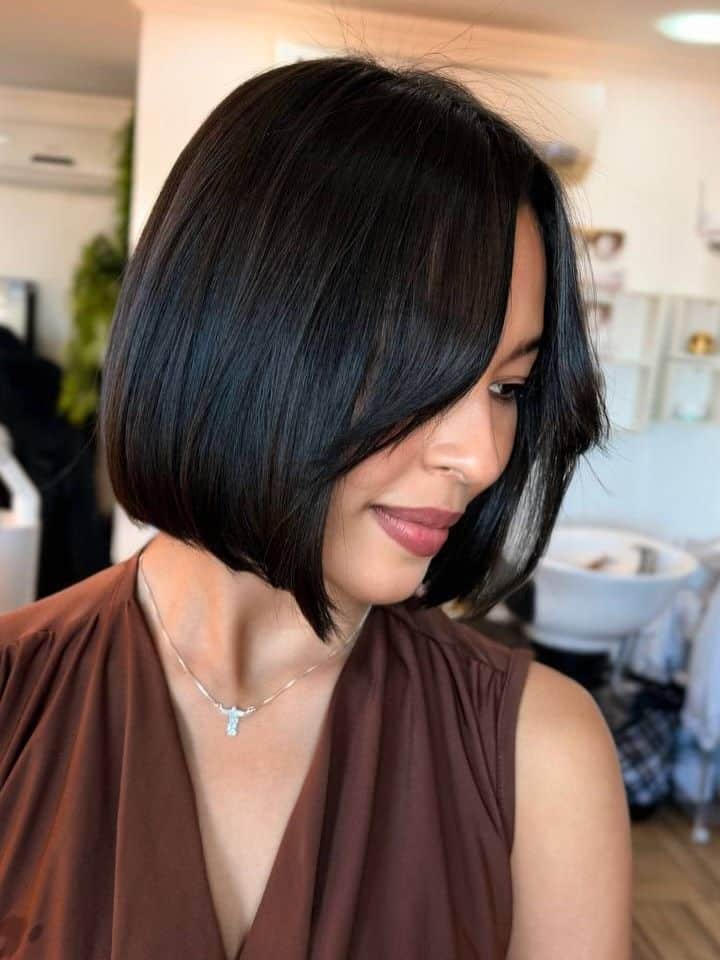 36. Sleek Inverted Bob with Face-Framing Layers