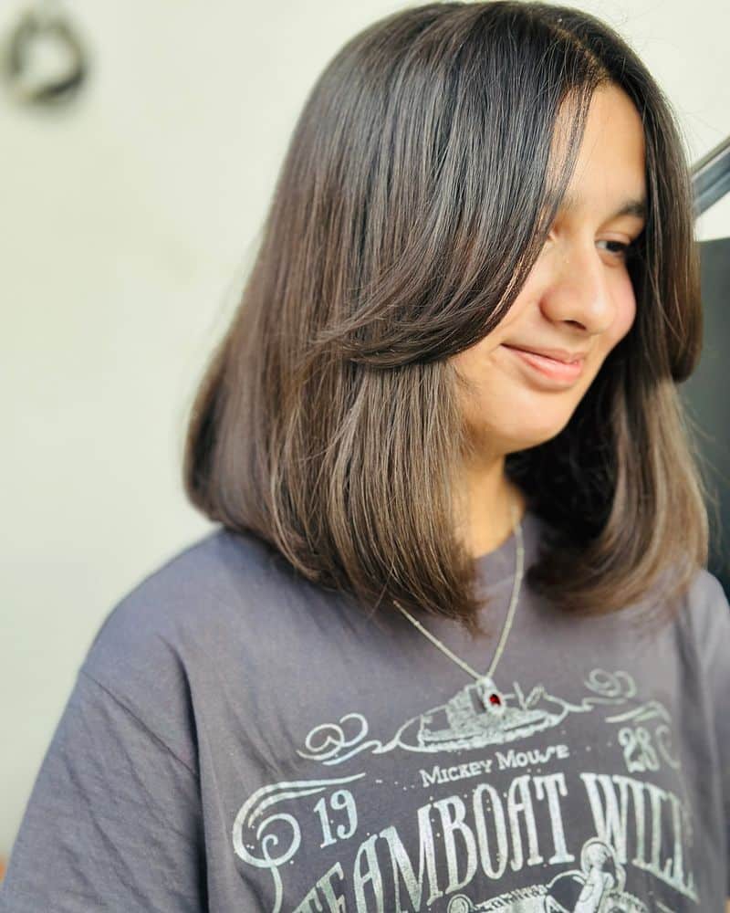 61. Sleek Lob with Curled-Under Ends
