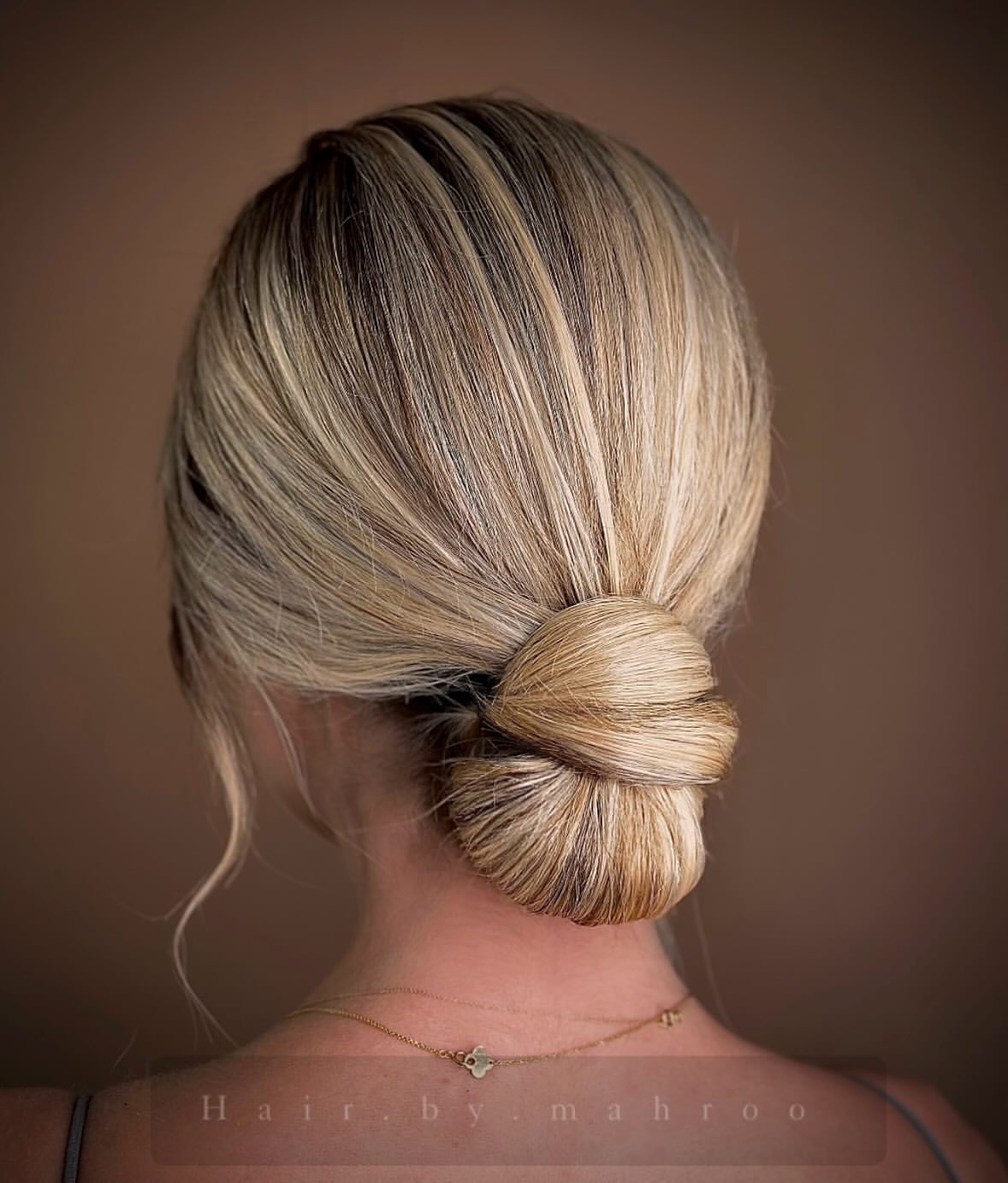 28. Sleek Low Wrap Bun