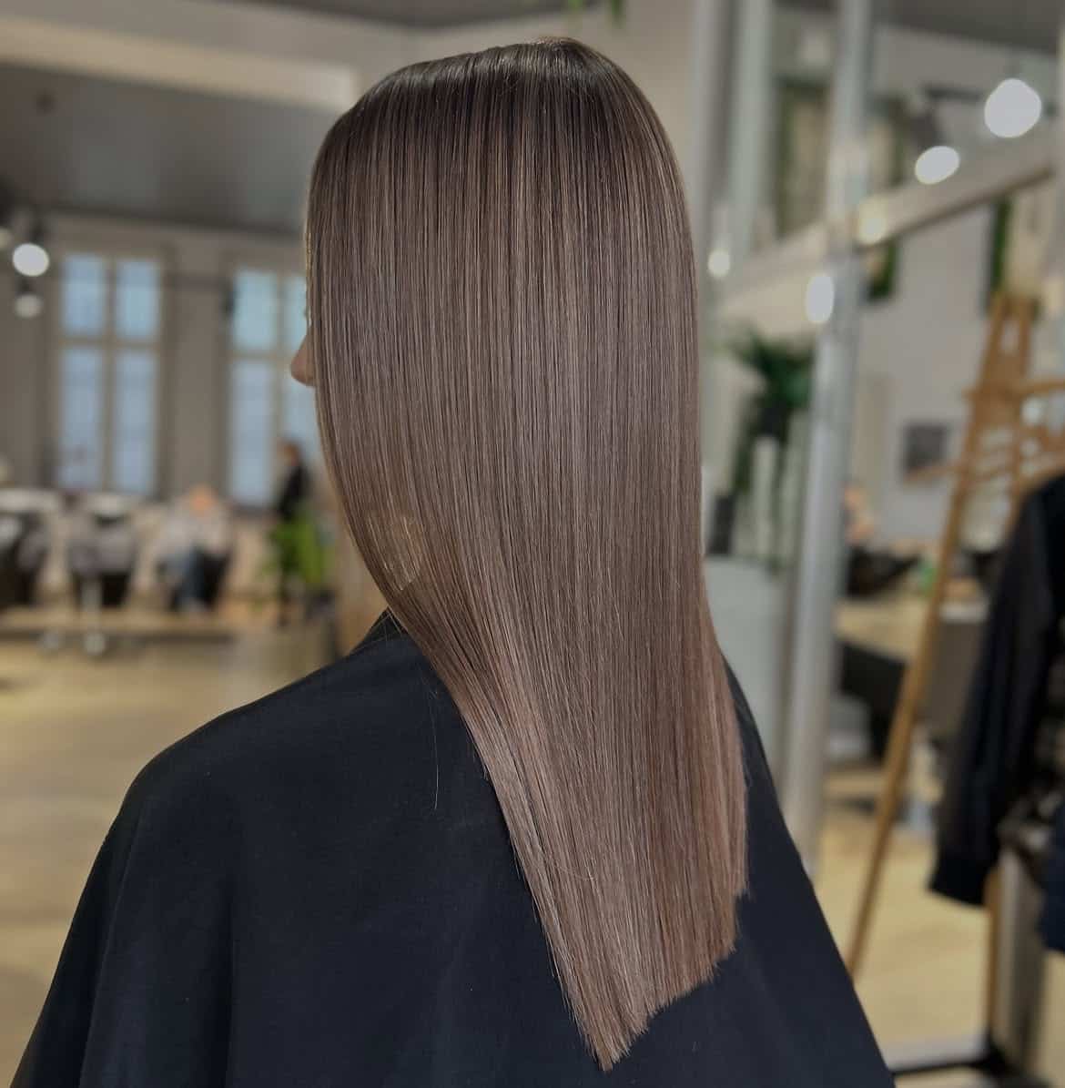 23. Sleek Silvery Mushroom Ash Straight Hair