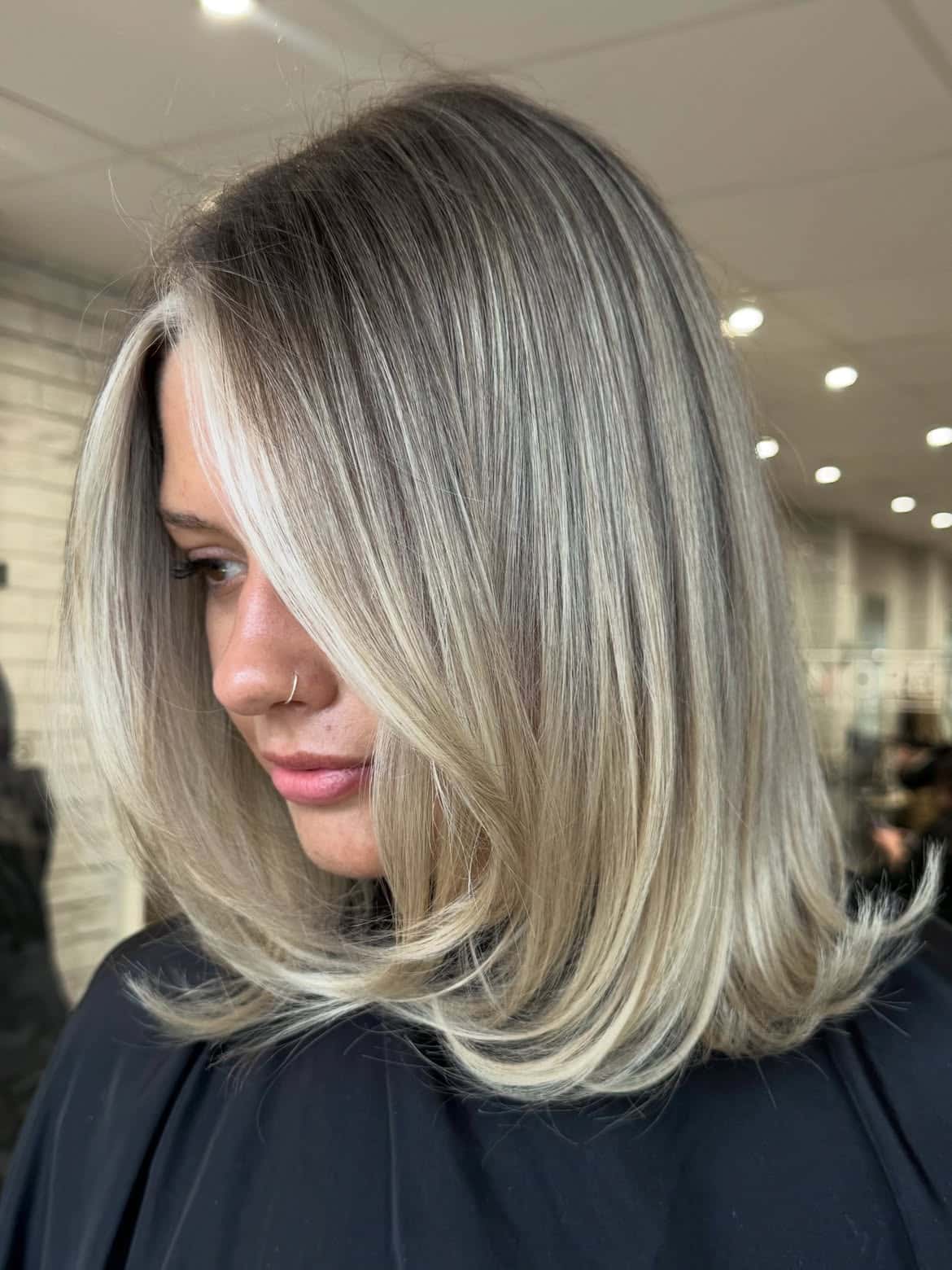 37. Smoked Vanilla Lob with Bright Face-Framing Streaks