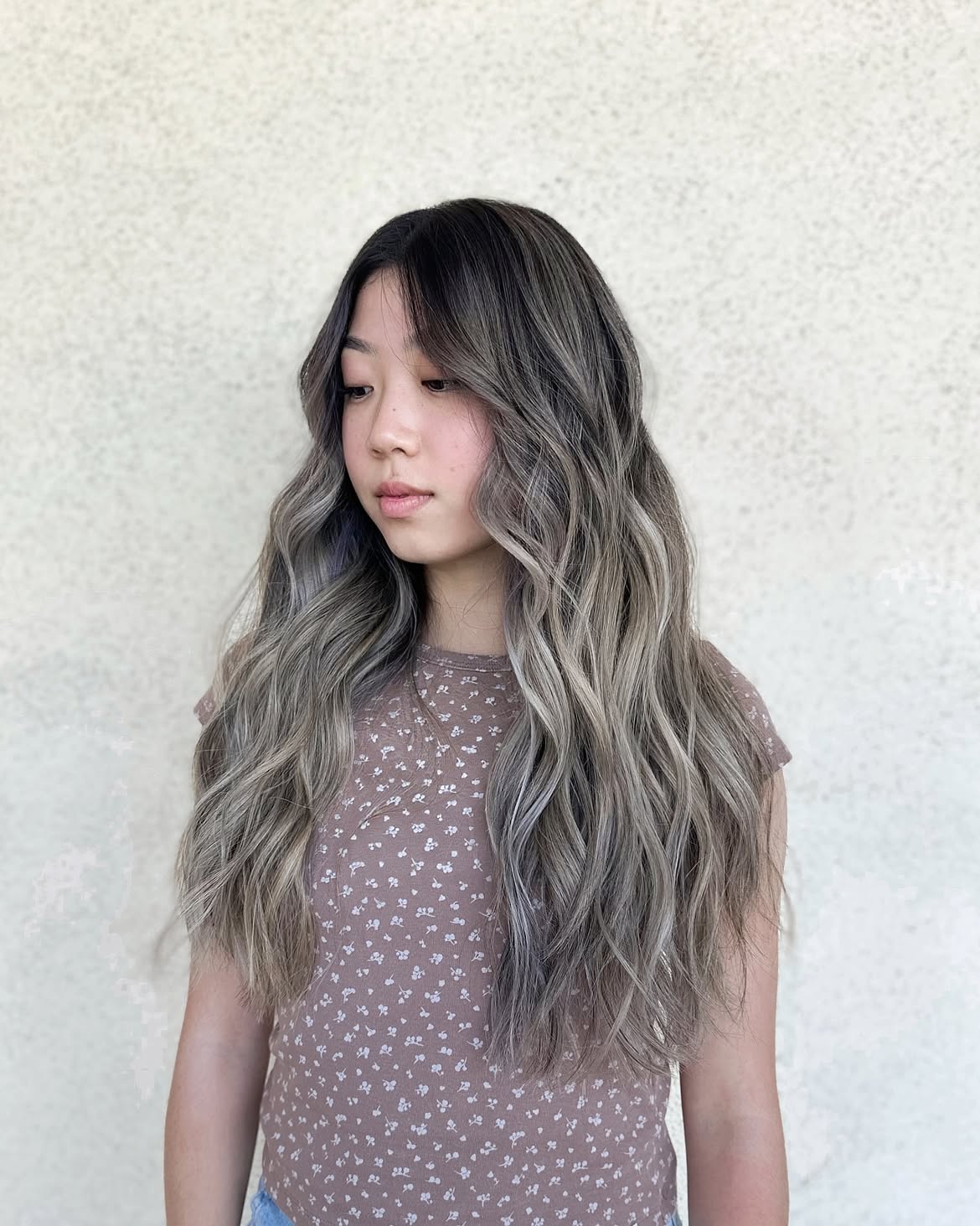 15. Smoky Ash Balayage with Face-Framing Waves