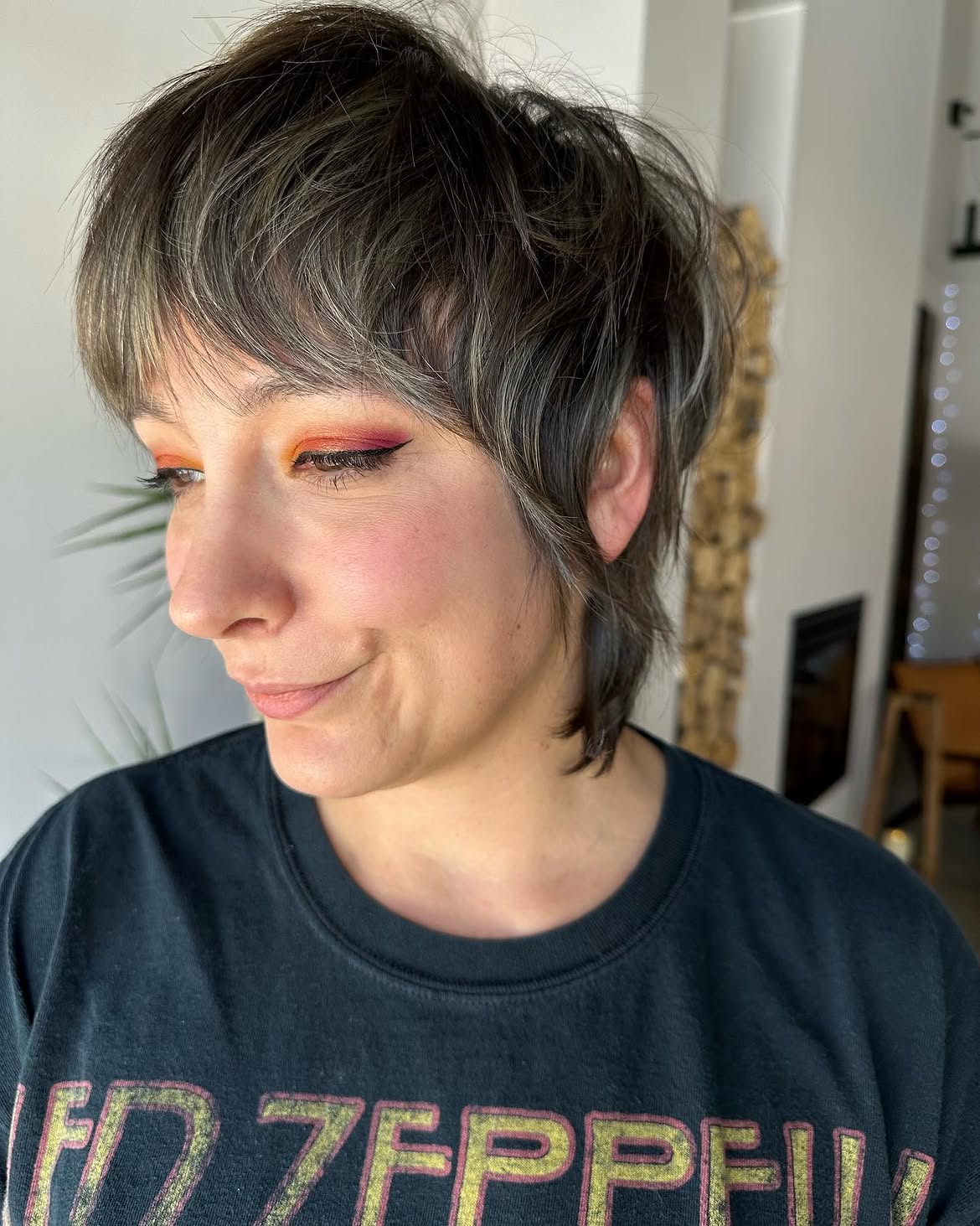 44. Smoky Brunette Pixie Mullet with Wispy Bangs