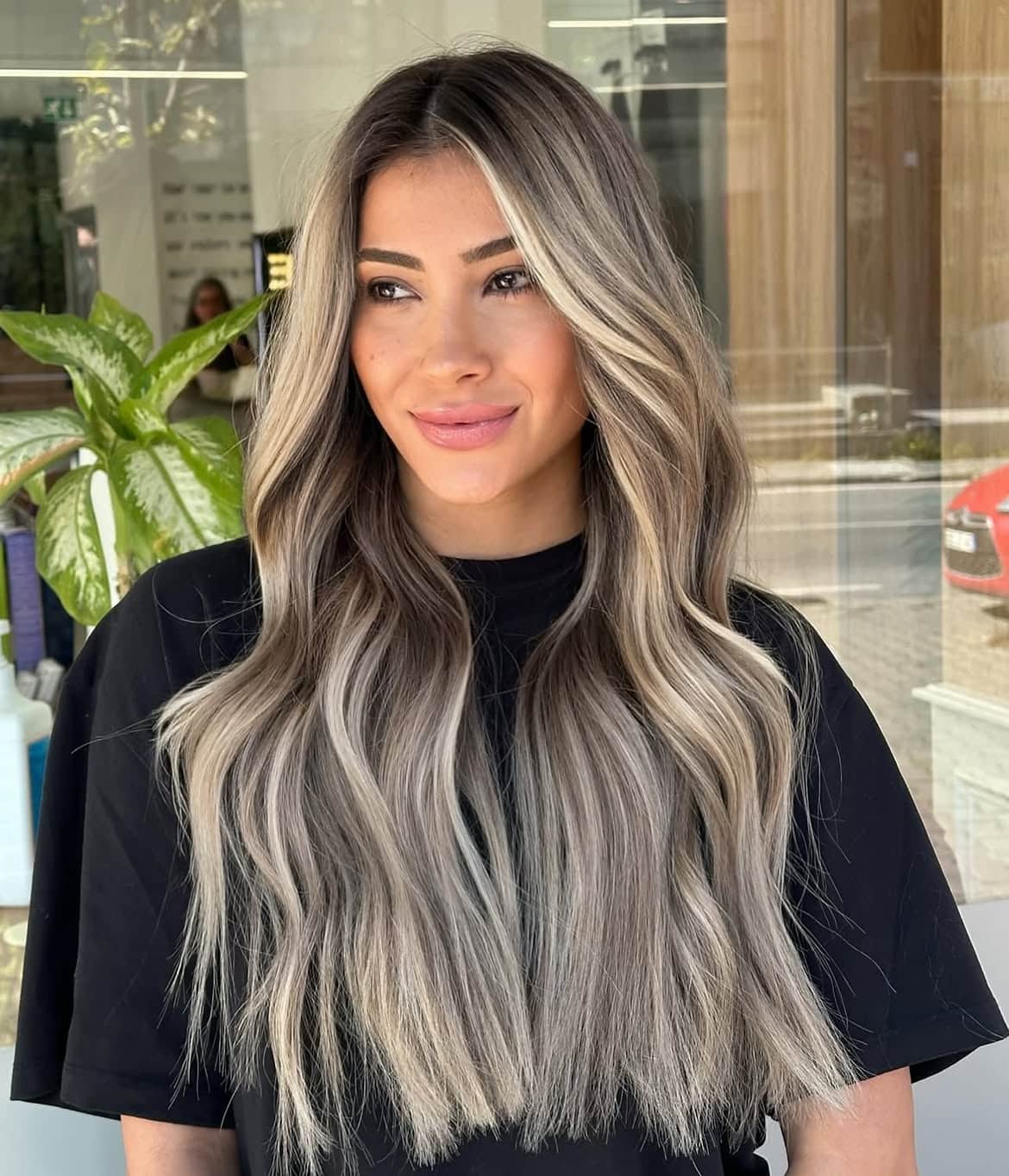 31. Smudged Roots with Bright Face-Framing Highlights