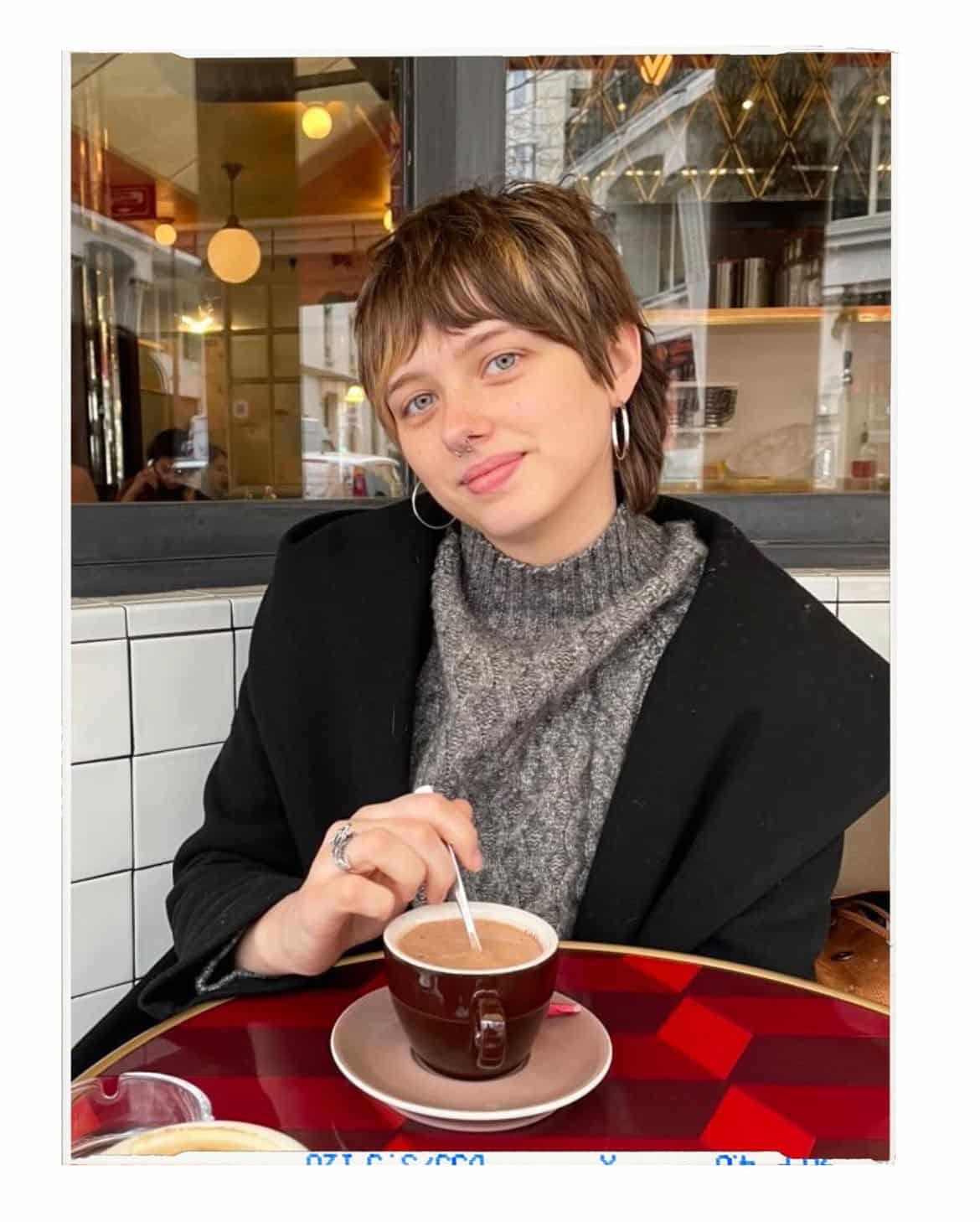 42. Soft Brunette Pixie Mullet with Wispy Bangs