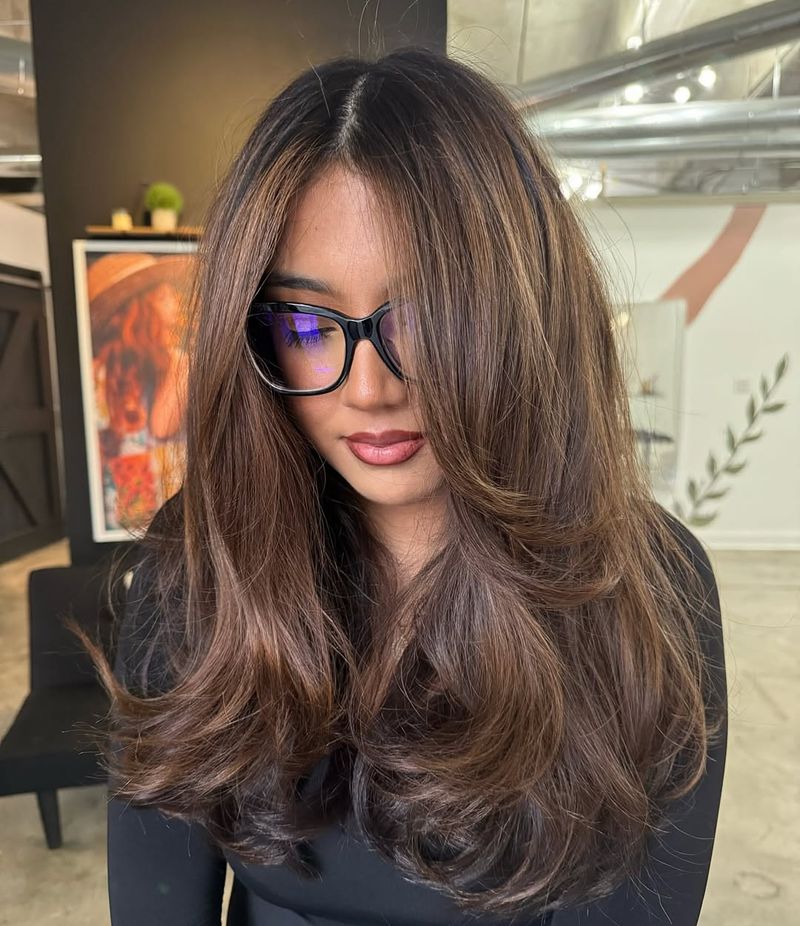 27. Soft Chestnut Blowout with Caramel Highlights