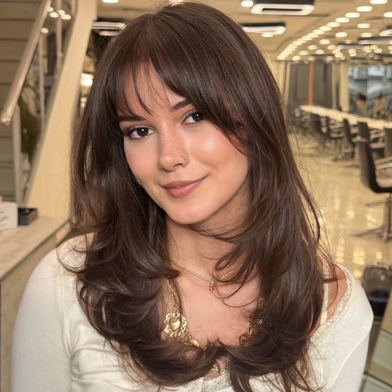 5. Soft Chestnut Blowout with Wispy Fringe