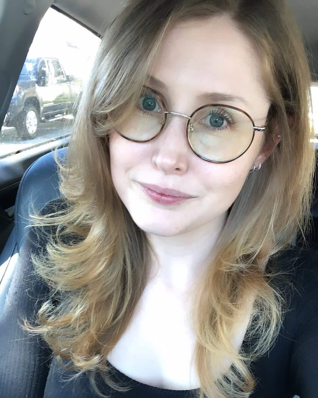 33. Soft Layered Blonde with Side-Swept Bangs