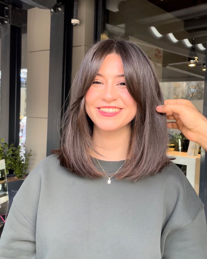 61. Soft Layered Lob with Center-Parted Fringe